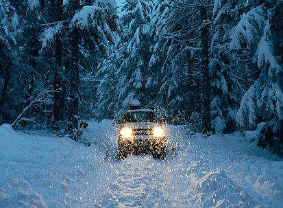SUV driving in the snow
