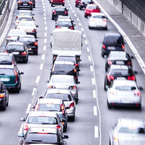 cars traveling on a freeway