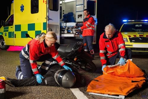 Motorcycle accident with paramedics on the scene