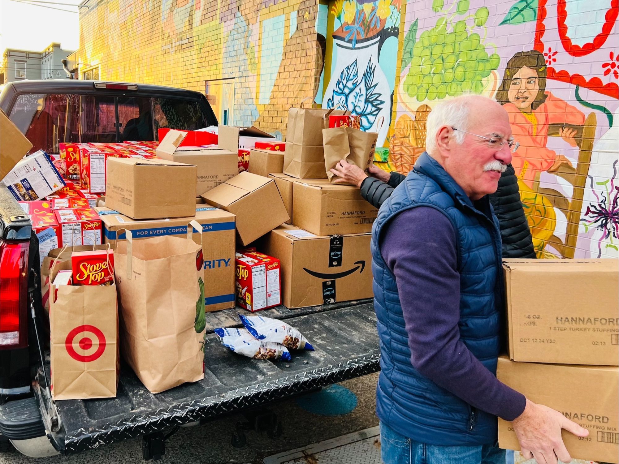 Man carrying boxes Photo